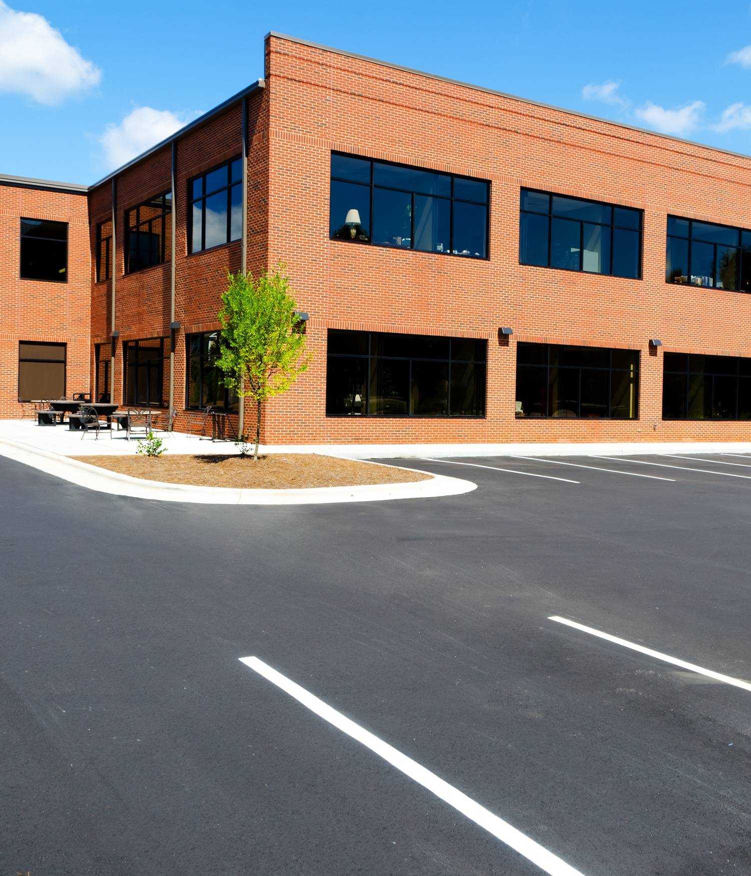 Read more about the article When Should a Business Replace Instead of Patch a Parking Lot? A Cost Comparison Guide
